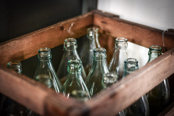 Glass Bottles Inside Wooden Crate