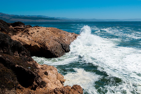 Rocky Coastline and Crashing Waves